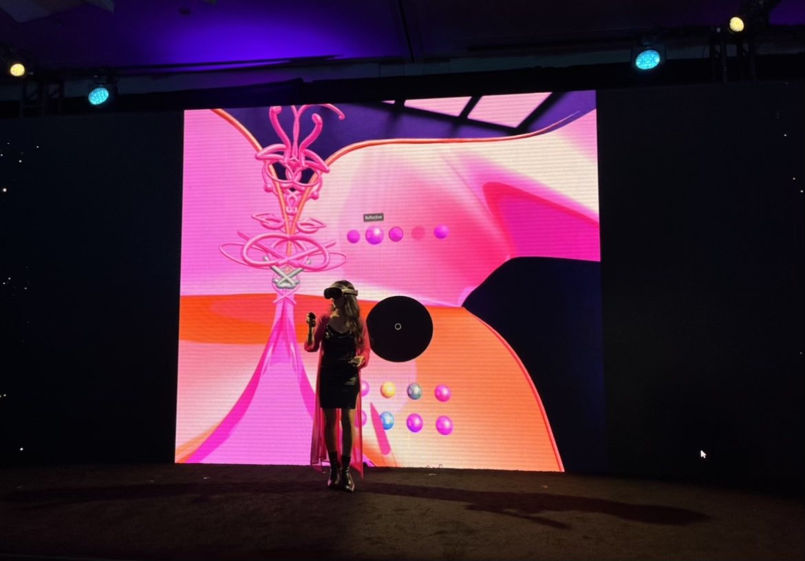 Wide view of the pink stage at the 11:11 Media summit